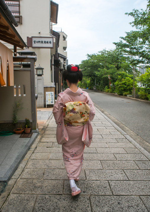 16 Years old maiko called chikasaya walking in the streets of gion, Kansai region, Kyoto, Japan