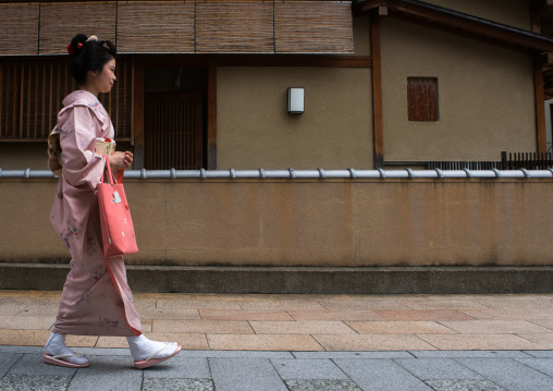 16 Years old maiko called chikasaya walking in the streets of gion, Kansai region, Kyoto, Japan