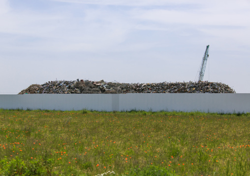 Bags containing irradiated debris are stacked in an area that was affected by the 2011 tsunami and nuclear disaster, Fukushima prefecture, Namie, Japan