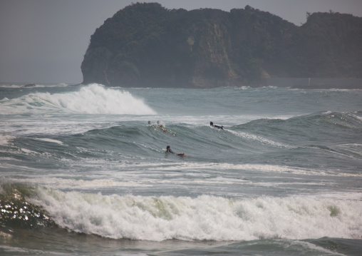 Japanese surfers in the contaminated area after the daiichi nuclear power plant irradiation, Fukushima prefecture, Tairatoyoma beach, Japan