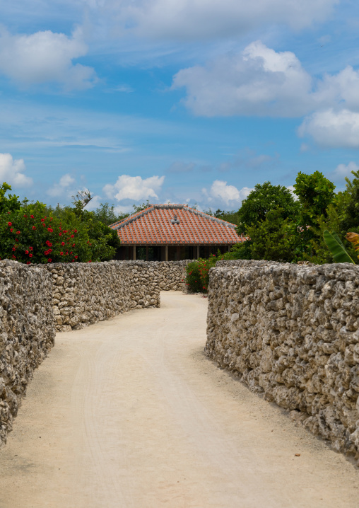 Sandy alley in Hoshinoya hotel, Yaeyama Islands, Taketomi island, Japan