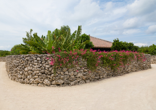 Sandy alley in Hoshinoya hotel, Yaeyama Islands, Taketomi island, Japan