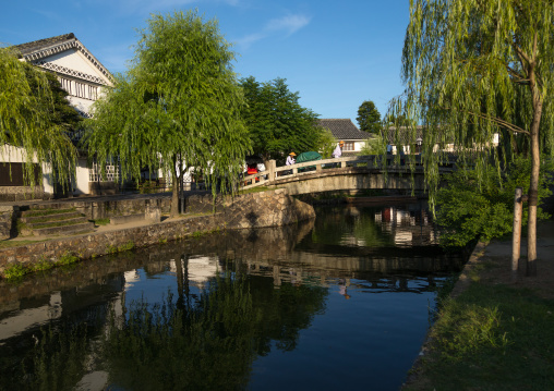 Bridge over the river and old houses in Bikan historical quarter, Okayama Prefecture, Kurashiki, Japan