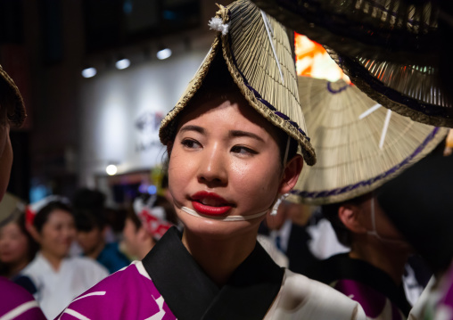 Japanese woman with straw hat during the Koenji Awaodori dance summer street festival, Kanto region, Tokyo, Japan