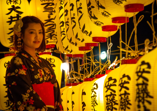 Japanese woman in yaukuta during Gokoku shrine Mitama matsuri Obon festival celebrating the return of the spirits of the deads, Kyushu region, Fukuoka, Japan