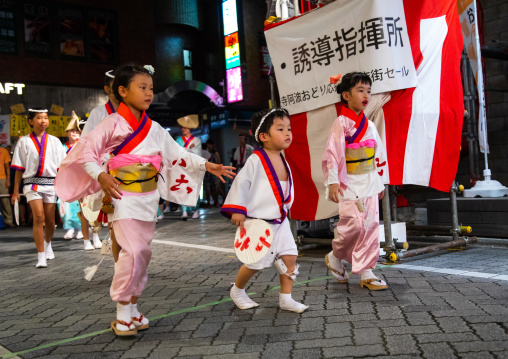 Japanese children during the Koenji Awaodori dance summer street festival, Kanto region, Tokyo, Japan