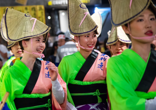 Japanese women with straw hats during the Koenji Awaodori dance summer street festival, Kanto region, Tokyo, Japan