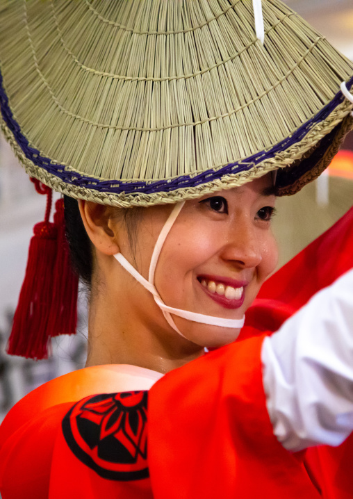 Japanese woman with straw hat during the Koenji Awaodori dance summer street festival, Kanto region, Tokyo, Japan