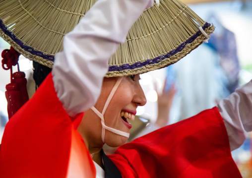 Japanese woman with straw hat during the Koenji Awaodori dance summer street festival, Kanto region, Tokyo, Japan