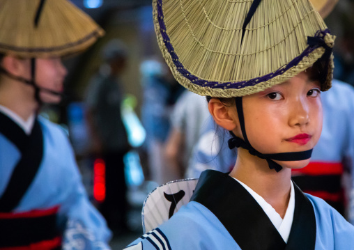 Japanese child with straw hat during the Koenji Awaodori dance summer street festival, Kanto region, Tokyo, Japan