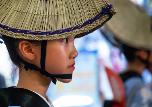 Japanese child with straw hat during the Koenji Awaodori dance summer street festival, Kanto region, Tokyo, Japan