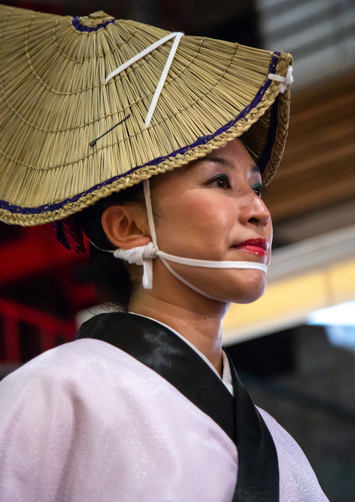 Japanese woman with straw hat during the Koenji Awaodori dance summer street festival, Kanto region, Tokyo, Japan