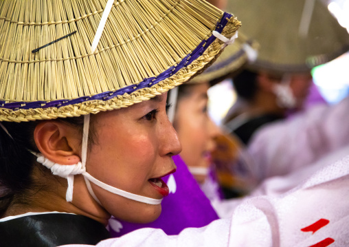 Japanese women with straw hats during the Koenji Awaodori dance summer street festival, Kanto region, Tokyo, Japan