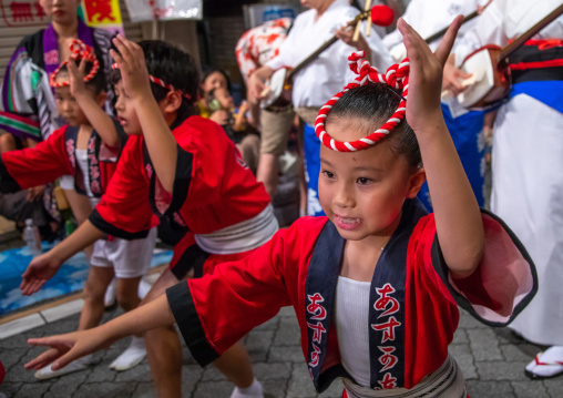 Japanese children during the Koenji Awaodori dance summer street festival, Kanto region, Tokyo, Japan