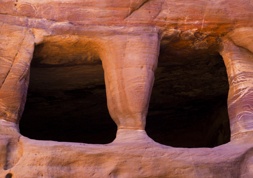 Facade Of Tombs Carved Into The Striated Sandstone Rocks, Petra, Jordan