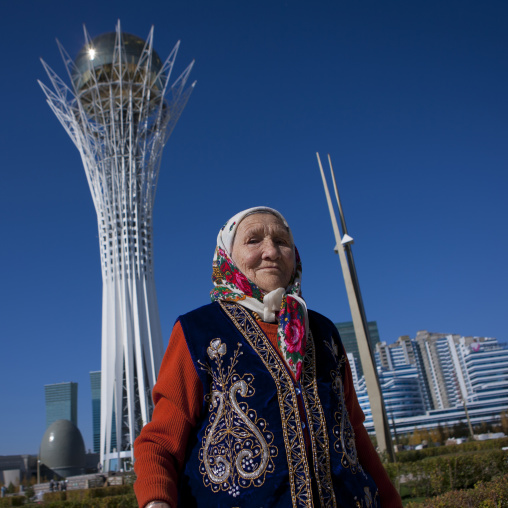 Old Woman In Front Of Baiterek Tower, Astana, Kazakhstan