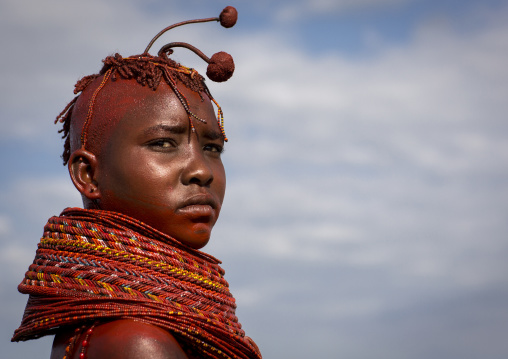 Turkana tribe woman with huge necklaces and ear rings, Turkana lake, Loiyangalani, Kenya