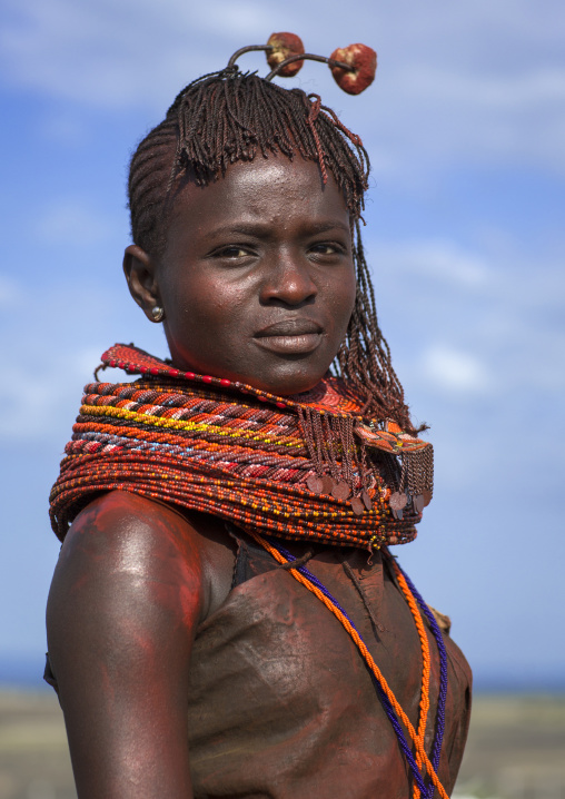 Turkana tribe woman with huge necklaces and ear rings, Turkana lake, Loiyangalani, Kenya