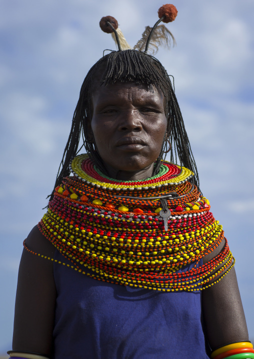 Turkana tribe woman with huge necklaces and ear rings, Turkana lake, Loiyangalani, Kenya