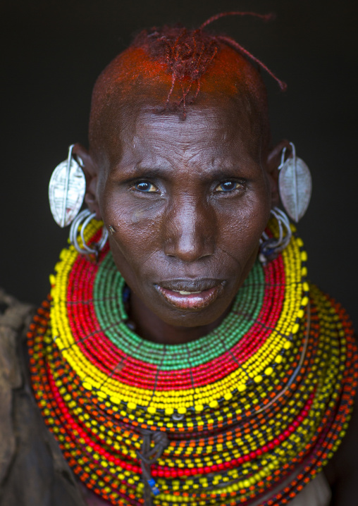 Turkana tribe woman with huge necklaces and earrings, Turkana lake, Loiyangalani, Kenya