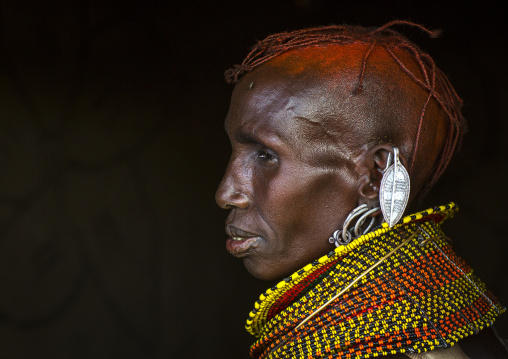 Turkana tribe woman with huge necklaces and earrings, Turkana lake, Loiyangalani, Kenya