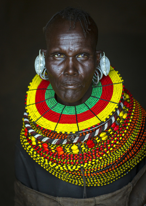 Turkana tribe woman with huge necklaces and earrings, Turkana lake, Loiyangalani, Kenya