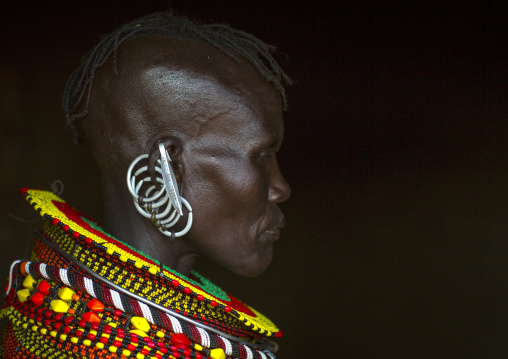 Turkana tribe woman with huge necklaces and earrings, Turkana lake, Loiyangalani, Kenya