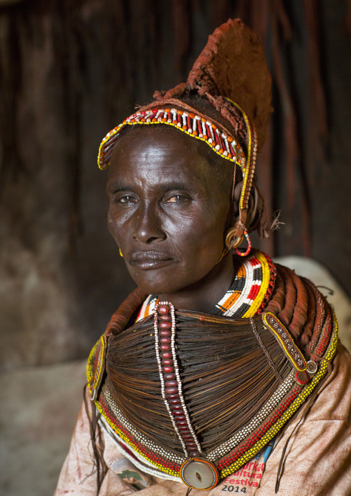 Rendille tribeswoman wearing doko headdress and mpooro engorio necklace, Turkana lake, Loiyangalani, Kenya