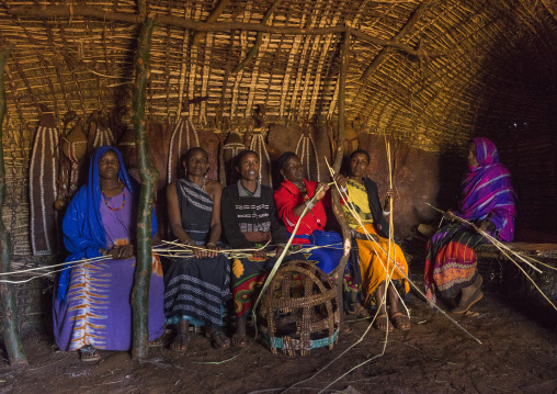 Borana tribe women inside a hut, Chalbi desert, Marsabit, Kenya