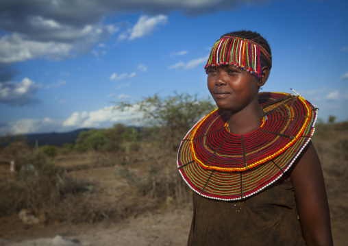 A pokot woman wears large necklaces made from the stems of sedge grass, Baringo county, Baringo, Kenya