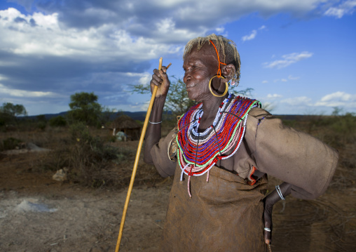 A pokot woman wears large necklaces made from the stems of sedge grass, Baringo county, Baringo, Kenya