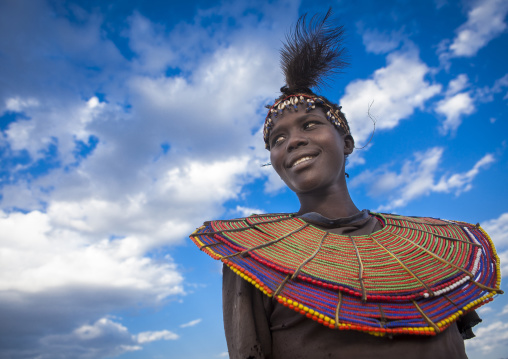 A pokot woman wears large necklaces made from the stems of sedge grass, Baringo county, Baringo, Kenya