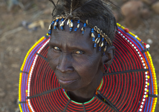 A pokot woman wears large necklaces made from the stems of sedge grass, Baringo county, Baringo, Kenya