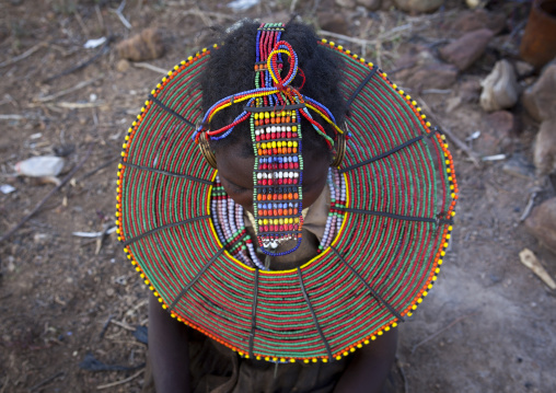 A pokot woman wears large necklaces made from the stems of sedge grass, Baringo county, Baringo, Kenya