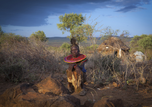 A pokot woman wears large necklaces made from the stems of sedge grass, Baringo county, Baringo, Kenya