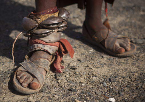 Turkana tribe woman in traditional footwear 'firestone' sandals, Turkana lake, Loiyangalani, Kenya