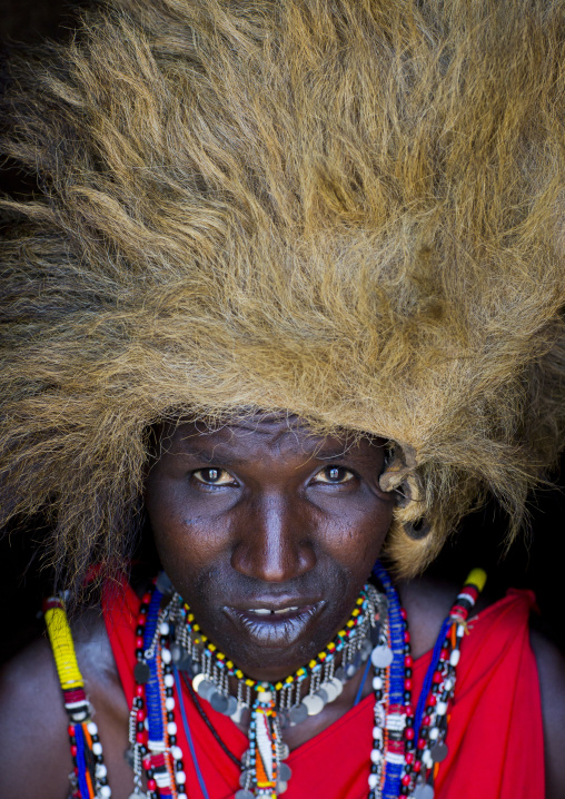 Maasai warrior with a lion hat fur on the head, Nakuru county, Nakuru, Kenya