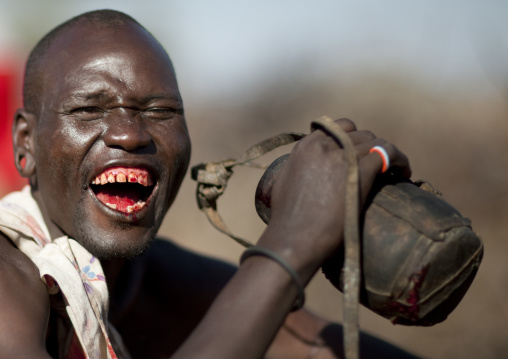 Samburu tribe man drinking cow blood, Samburu County, Maralal, Kenya