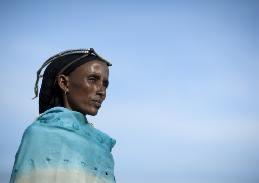 Portrait of a Gabra tribe woman wearing the traditional headwear, Marsabit County, Chalbi Desert, Kenya