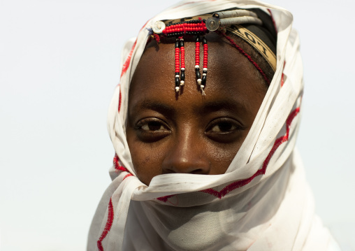 Portrait of a Gabra tribe woman wearing the traditional headwear, Marsabit County, Chalbi Desert, Kenya