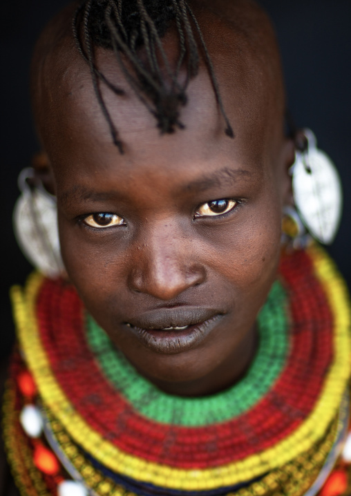 Smiling Turkana tribe woman with necklaces and earrings, Rift Valley Province, Turkana lake, Kenya