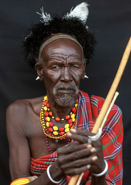 Portrait of a Turkana tribe leader with ostrich feathers on the headwear, Rift Valley Province, Turkana lake, Kenya