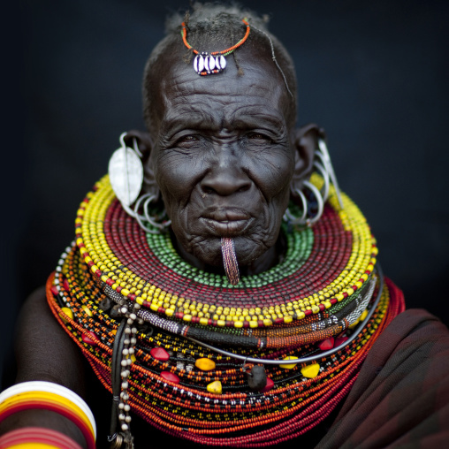 Portrait of a Turkana tribe woman with huge necklaces, Rift Valley Province, Turkana lake, Kenya