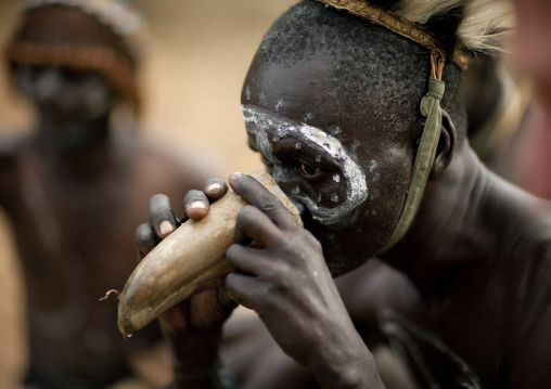 Tharaka tribe man drinking in a calabash, Laikipia County, Mount Kenya, Kenya