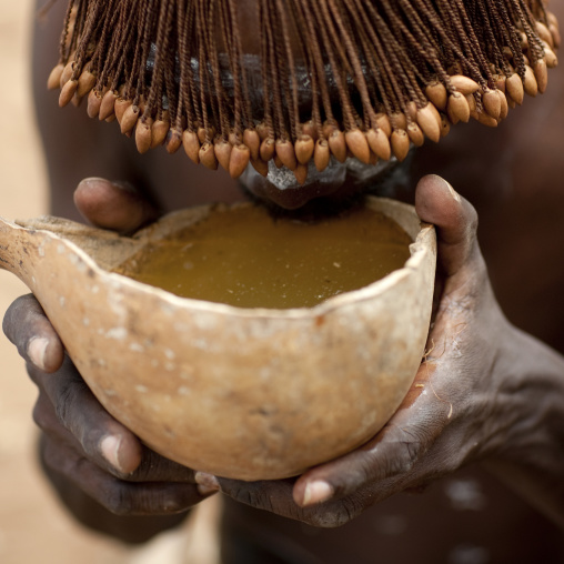 Tharaka tribe woman drinking in a calabash, Laikipia County, Mount Kenya, Kenya