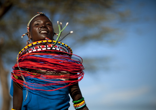 Samburu tribe woman with beaded necklaces dancing, Samburu County, Maralal, Kenya