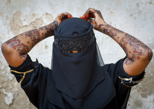 Muslim woman with henna on the hands and arms, Lamu County, Lamu, Kenya