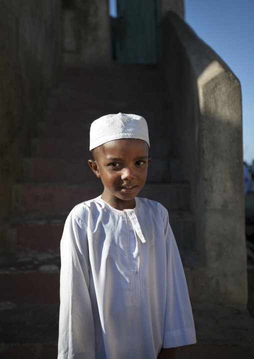 Young muslim boy during Maulid festival, Lamu County, Lamu, Kenya