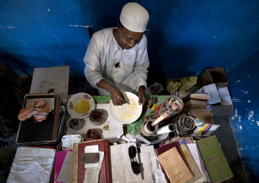 Kenyan witch doctor practicing black magic in his house, Lamu County, Lamu, Kenya