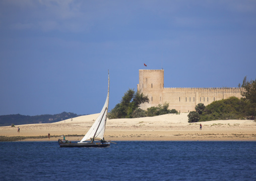 Dhow sailing along the coast in front of Fort hotel, Lamu County, Shela, Kenya